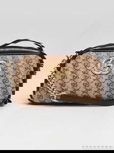 Gucci Beige/Ebony GG Diagonal Quilted Canvas Marmont Small Camera Bag: Handle Drop: 23" adjustableMeasurements: 9.5" L x 2.75" x W x 5.5" H. Pre-owned,Brand: Gucci,Exterior Material: Canvas,Style: Crossbody Bags,Everyday Bags,Exterior Color: Brown,Department: Women
