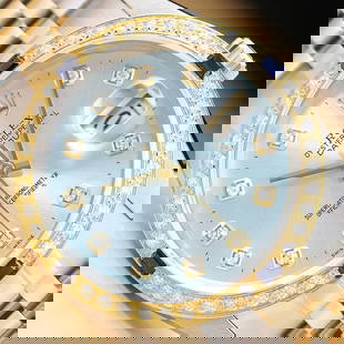 ROLEX MENS DATEJUST 18K YELLOW GOLD SAPPHIRE DIAMOND & STEEL WATCH 16233: This is an authentic Rolex watch with a Rolex 18K yellow gold and stainless steel jubilee bracelet, Rolex dial with added genuine diamond markers, and custom 18K yellow gold sapphire diamond bezel.Des