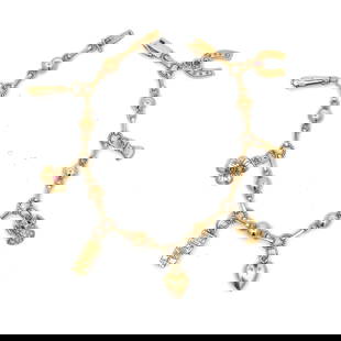 Vintage Charm Bracelet In 18K Yellow Gold: Condition: Pre-owned,Brand: Unbranded,Type: Bracelet,Metal Purity: 18k,Closure: Box,Color: Yellow,Style: Chain, Charm,Base Metal: Gold,Metal: Yellow Gold,Item Length: 8,Main Stone: No Stone,Chain Type
