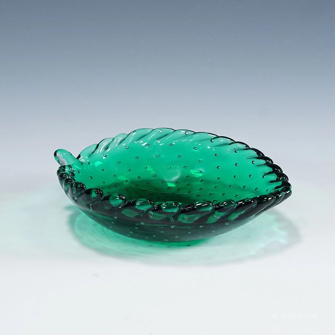 Small Leaf Bowl by Tyra Lundgren for Venini 1950s: Condition: Used,Brand: ArtGlass,Material: Glass,Type: Art Glass,Handmade: Yes,Vintage: YesSmall bowl made of green glass with regular air bubble decoration and a pinched rim. Designed by Tyra Lundgren