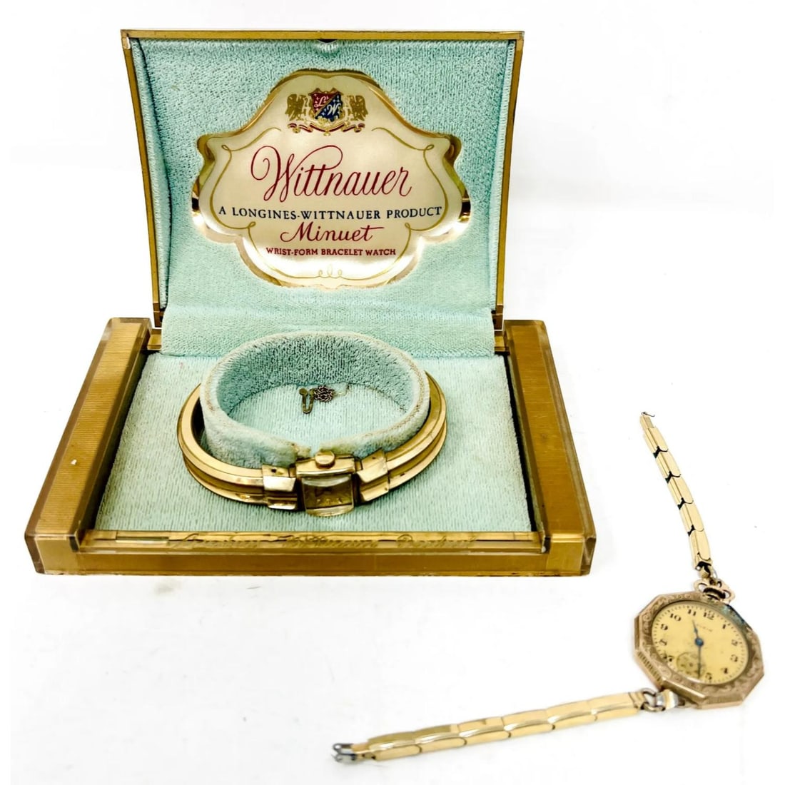 (2) Ladies Vintages Watches both Gold Filled: This lot includes a 10K Gold filled Vintage Ladies Longines Wittnaver Minuet Wrist Form wind up Bracelet Watch in original box-safety chain included (but not attached) and a gold filled top ladies Elg