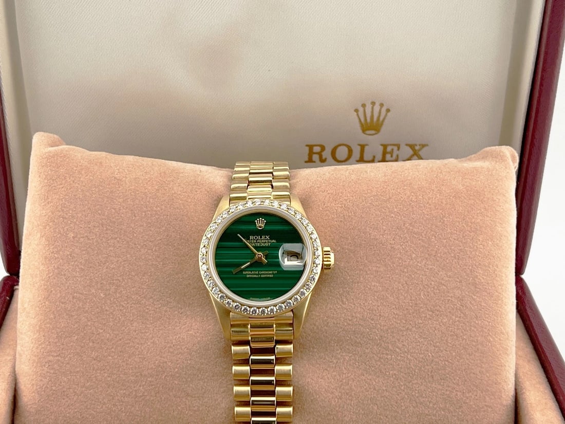 Rolex Ladies President 6917 Malachite Dial Diamond Bezel 18K Yellow Gold: Condition: Pre-owned - Good,Bezel Color: Gold,Dial Pattern: malachite,Year Manufactured: 1980-1989,Band/Strap: Rolex President,Case Color: Gold,Department: Women,Caseback: Solid,Bezel Type: Diamond,Wa
