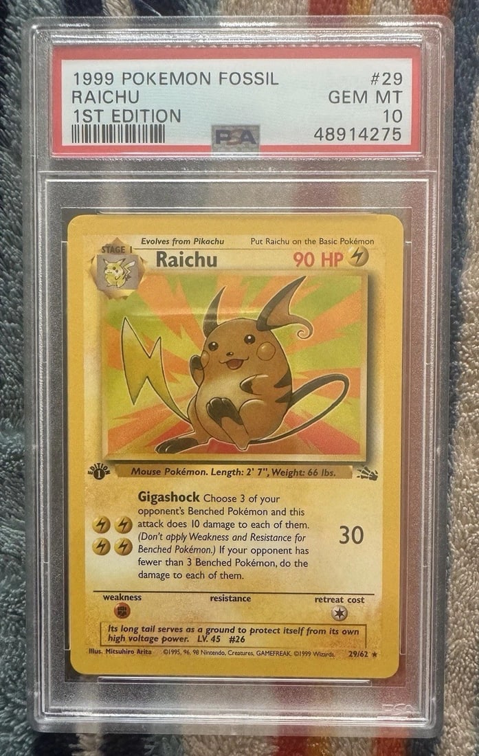 1999 Pokemon Fossil 1st Edition Holo Raichu #14 PSA 10 GEM MINT: 1999 Pokemon Fossil 1st Edition Holo Raichu #14 PSA 10 GEM MINT