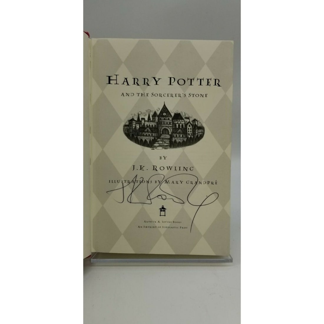 Harry Potter and the Sorcerers Stone 1st Edition SIGNED by Author J.K Rowling (1 of 2)