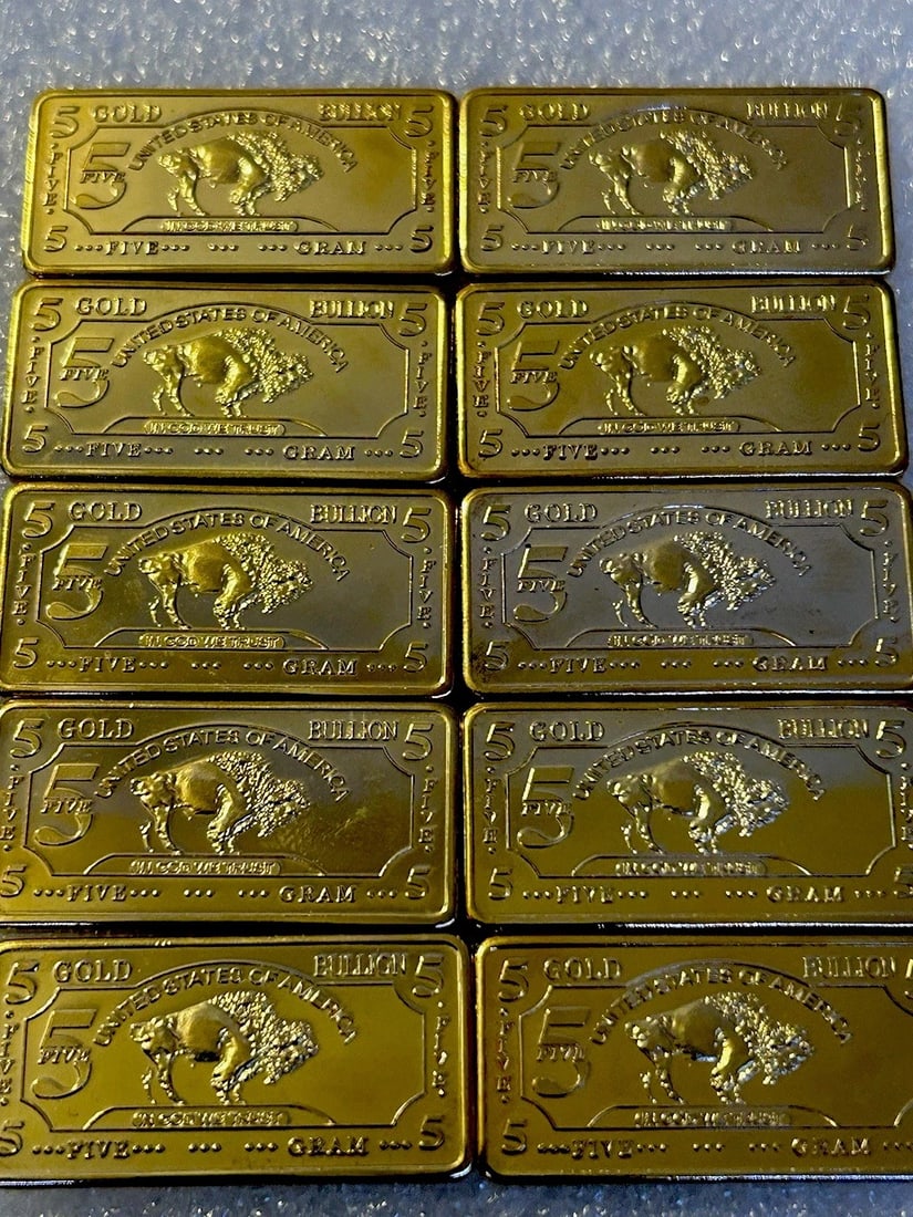 10 Pcs - 5 GRAM 100 MILLLS GOLD CLAD DIPPED BUFFALO BULLION BARS .999 FINE: These are NOT real gold, just gold clad dipped. Country of Origin: United States,Composition: Gold,Shape: Bar,Fineness: 0.999,Precious Metal Content: 100 Mills,Precious Metal Content per Unit: 5 g,Bra
