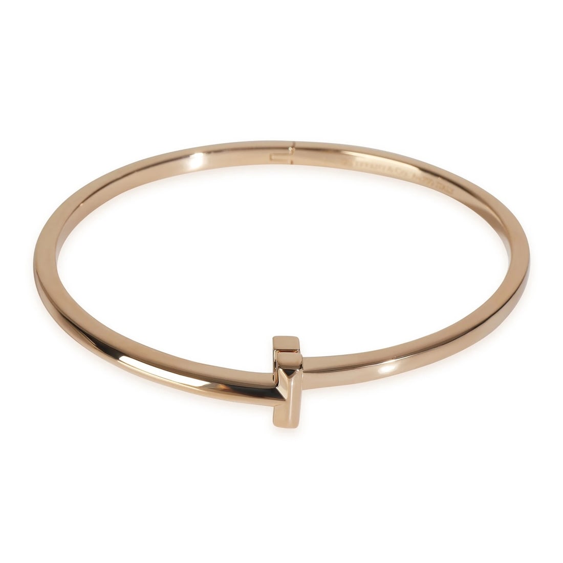 Tiffany & Co. Rose Gold Tiffany T T1 Narrow Hinged Bracelet: Condition: Pre-owned,Country of Origin: Italy,Item Length: 6.5 in,Clasp/Buckle Type: Pusher,Side Stone Type: No Stone,Metal Purity: 18k,With Original Box/Packaging: No,With Papers: No,Gross Weight (gr