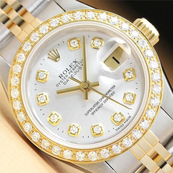 ROLEX LADIES DATEJUST 69173 SILVER DIAL 18K YELLOW GOLD DIAMOND STEEL WATCH: Condition: Pre-owned - Good,Bezel Color: Gold,Max Wrist Size: 6.26-6.75 in,Number of Jewels: 29 Jewels,Indices: Diamond Markers, 12-Hour Dial,Band: Rolex Two Tone Jubilee Bracelet,Bezel: Custom 18K Ye