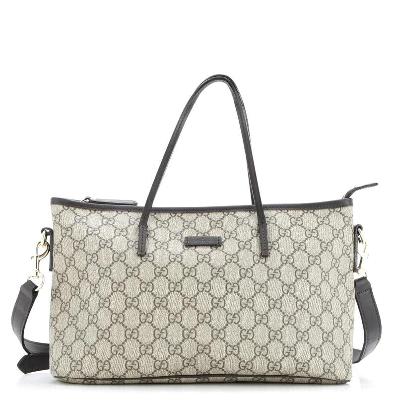 Gucci Convertible Zip Tote GG Coated Canvas with Leather Medium: Measurements: Handle Drop 5.5", Height 8", Width 12.5", Depth 4.5", Strap Drop 20-22" . Condition: Pre-owned - Good,Brand: Gucci,Exterior Material: Canvas Coated,Style: Totes,Exterior Color: Brown,Dep