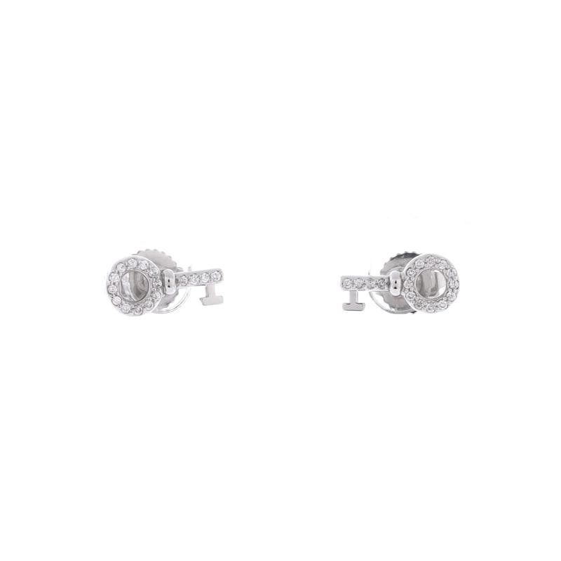 Tiffany & Co. Key Stud Earrings 18K White Gold with Diamonds Mini: Measurements: Height/Length: 10.65 mm, Width: 5.40 mm . Condition: Pre-owned - Good,Brand: Tiffany & Co.,Main Stone: Unknown,Metal: 18K White Gold,Metal Purity: 18K,Style: Stud,Type: Earrings,Color: