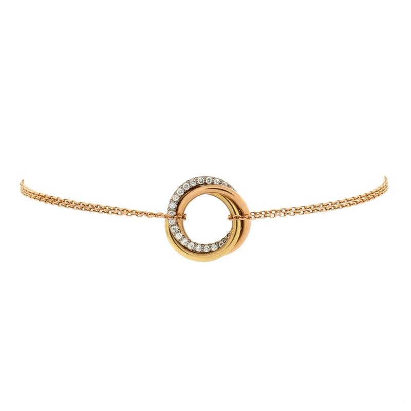 Cartier Trinity Chain Bracelet 18K Tricolor Gold and Diamonds: Condition: Pre-owned - Good: This item has been gently used but is in good condition. It might have a few signs of wear, like light scratches or tarnishing. All imperfections should be shown and