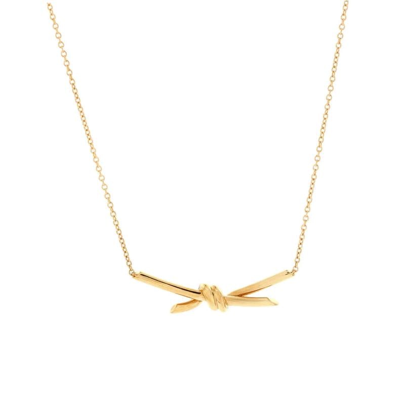 Tiffany & Co. Knot Pendant Necklace 18K Yellow Gold: Condition: Pre-owned - Good,Brand: Tiffany & Co.,Main Stone: Unknown,Metal: 18K Yellow Gold,Metal Purity: 18K,Style: Pendant,Type: Necklace,Color: Yellow Gold,Material: 18K Yellow Gold 