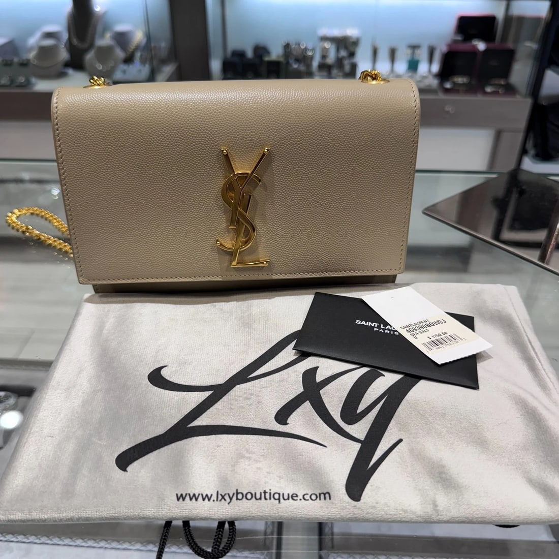 YSL Saint Laurent Small Kate in grain de poudre embossed leather SeaSalt (2020): Condition: Pre-owned - Good,Brand: Saint Laurent,Department: Women,Size: Small,Exterior Color: Sea Salt,Style: Crossbody,Exterior Material: Leather,Product Line: Saint Laurent KateRefined and
