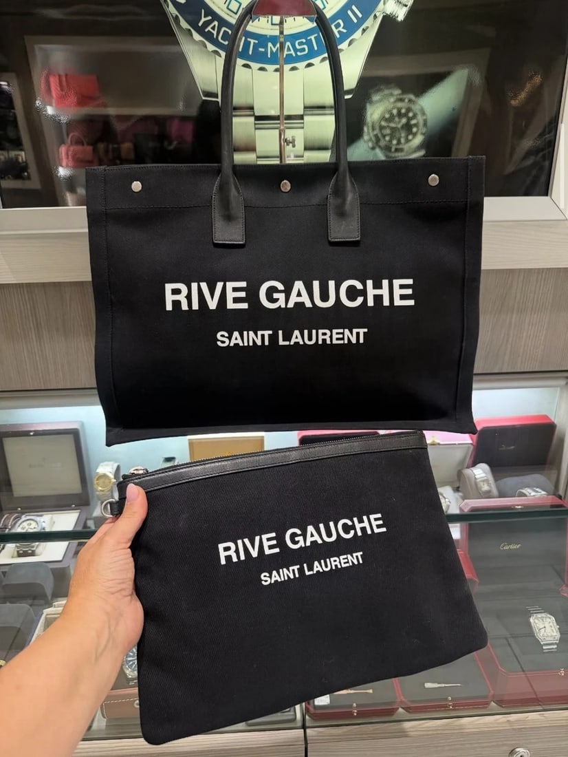 YSL Saint Laurent Rive Gauche Tote and Pouch Set: Condition: Pre-owned - Good,Brand: Saint Laurent,Department: Women,Size: Large,Lining Material: Canvas,Model: Saint Rive,Exterior Color: Beige,Hardware Color: Silver,Style: Tote,Exterior Material: Can