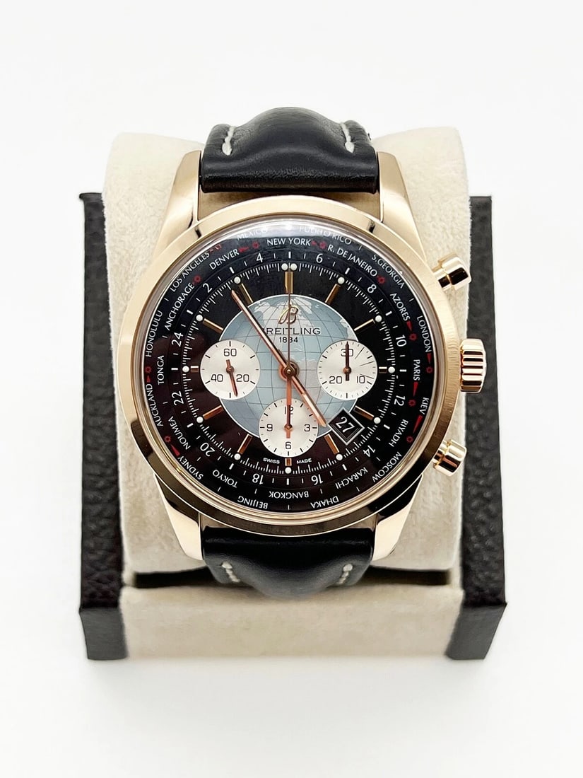 Breitling Transocean RB0510 46mm Chronograph 18K Rose Gold Leather Strap: Style Number: RB0510Year: 2013 Model: Breitling Transocean Unitime Case Material: 18K Rose Gold Band: Leather Bezel: 18K Rose Gold Dial: Black Face: Sapphire Crystal Case Size: 46mm Weight: 181 Grams