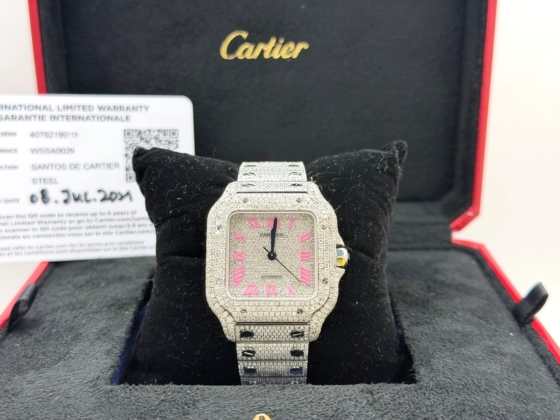 Cartier Santos Medium WSSA0029 35mm Diamond Case Bezel Iced Out Box Paper: Style Number: WSSA0029Serial: 40752119*****Year: 2021 Model: Cartier Santos Medium Iced Out / Bust Down Case Material: Custom Diamond Encrusted Stainless Steel Case Band: Custom Diamond Encrusted Stai