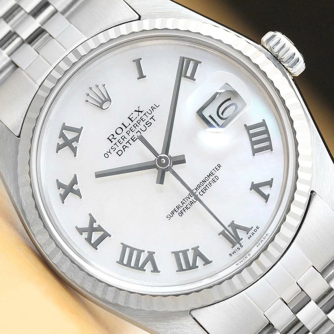 MENS ROLEX DATEJUST 16014 MOTHER OF PEARL ROMAN 18K WHITE GOLD STEEL WATCH: Condition: Pre-owned - Good,Bezel Color: Silver,Max Wrist Size: 7.26-7.5 in,Number of Jewels: 27 Jewels,Indices: Roman Numerals, 12-Hour Dial,Bezel: Rolex 18K White Gold Fluted Bezel,Band/Strap: Brace
