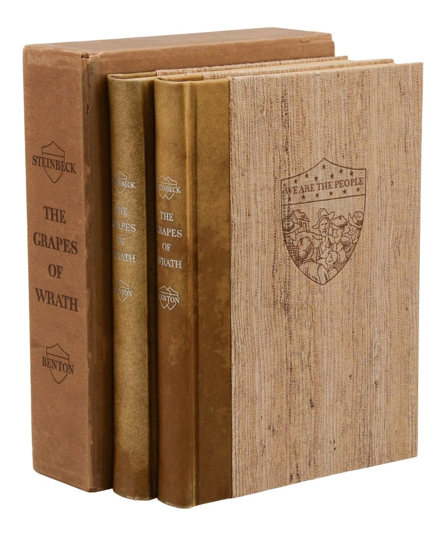 The Grapes of Wrath ~ SIGNED by THOMAS HART BENTON ~ Limited Edition ~ 1940: New York: The Limited Editions Club, 1940. Limited edition in two volumes, #517 of 1146 copies. Signed by the illustrator on the colophon. xxii, [2], 284; 285-559, [1] pp. Bound in publisher's "grass