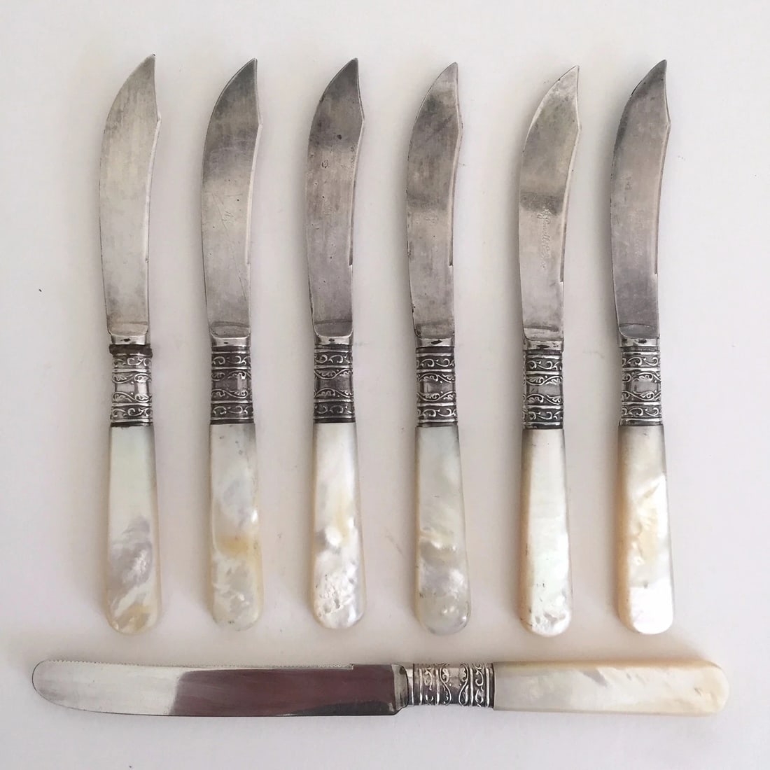 ANTIQUE 19TH C. STERLING SILVER REPOUSSE MOTHER OF PEARL FRUIT KNIVES - 7PC SET: Age: 1850-1899,Type: Set,Composition: Sterling Silver