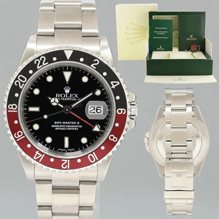 MINT 2001 Rolex GMT-Master II Coke Red Black Steel 16710 40mm Watch Box: BrandRolex (Guaranteed Authentic)ModelGMT-Master II 'Coke'Reference Number16710 Serial NumberKGenderMen'sMetalStainless SteelCase Size40.00mmWrist SizeThis watch will currently comfortably fit the