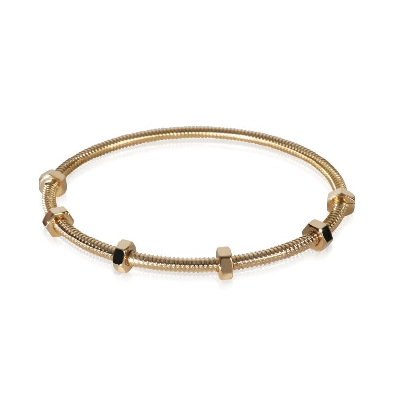 Cartier Yellow Gold Ecrou Bracelet: Condition: Pre-owned - Good,Item Length: 20 cm,Country of Origin: France,Clasp/Buckle Type: Pusher,Side Stone Type: No Stone,Metal Purity: 18k,With Original Box/Packaging: No,With Papers: No,Gross