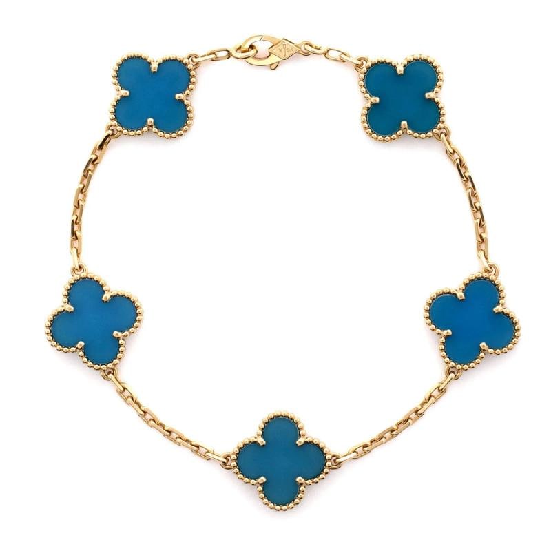 Van Cleef & Arpels Vintage Alhambra 5 Motifs Bracelet 18K Yellow Gold and Agate: Measurements: Circumference: 7.25 ", Width: 15 mm. Condition: Pre-owned - Good,Brand: Van Cleef & Arpels,Main Stone: Agate,Metal: 18K Yellow Gold,Metal Purity: 18K,Style: Bracelet,Type: Bracelet,Color