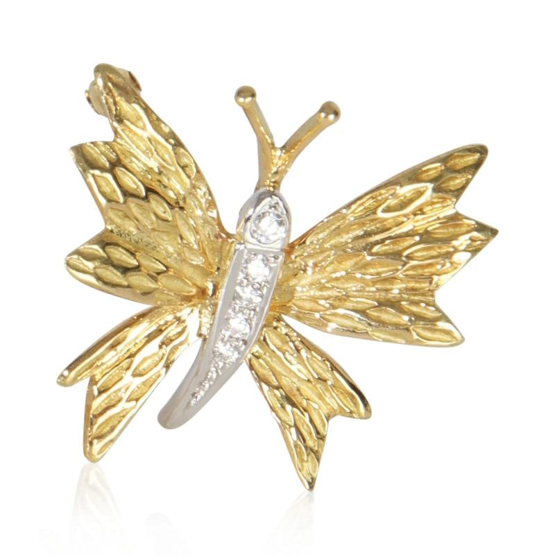 Tiffany & Co. Yellow Gold & Platinum Diamond Vintage Butterfly Brooch: Condition: Pre-owned - Good,Shape: Round Brilliant,Item Length: 24 mm,Country of Origin: Italy,Side Stone Type: Diamond,Side Stone Weight (cts): 0.10,Metal Purity: 18k,With Original Box/Packaging: