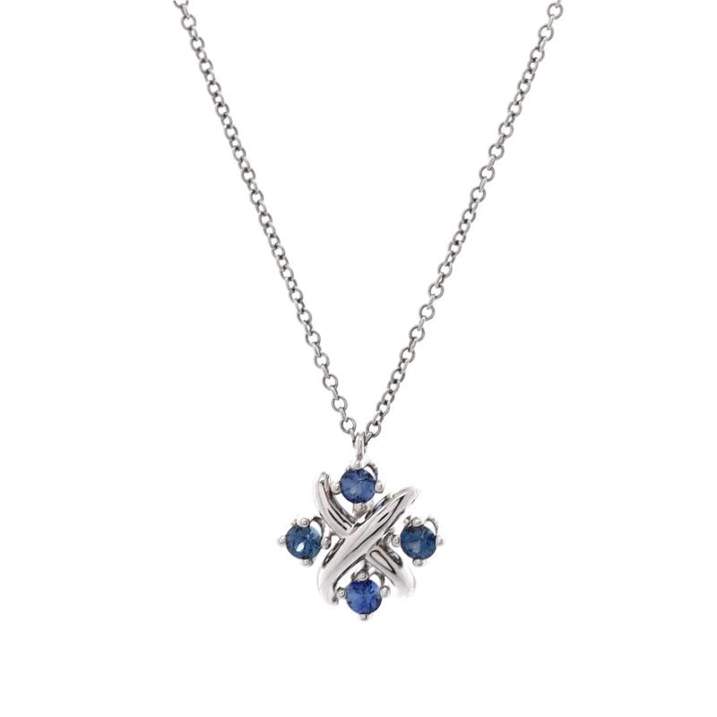 Tiffany & Co. Schlumberger Lynn Pendant Necklace Platinum with Blue Sapphires: Measurements: Length: 16.00 ", Pendant Length: 12.70 mm, Pendant Width: 11.20 mm. Condition: Pre-owned - Good,Brand: Tiffany & Co.,Main Stone: Unknown,Metal: Platinum (Pt950),Metal Purity: