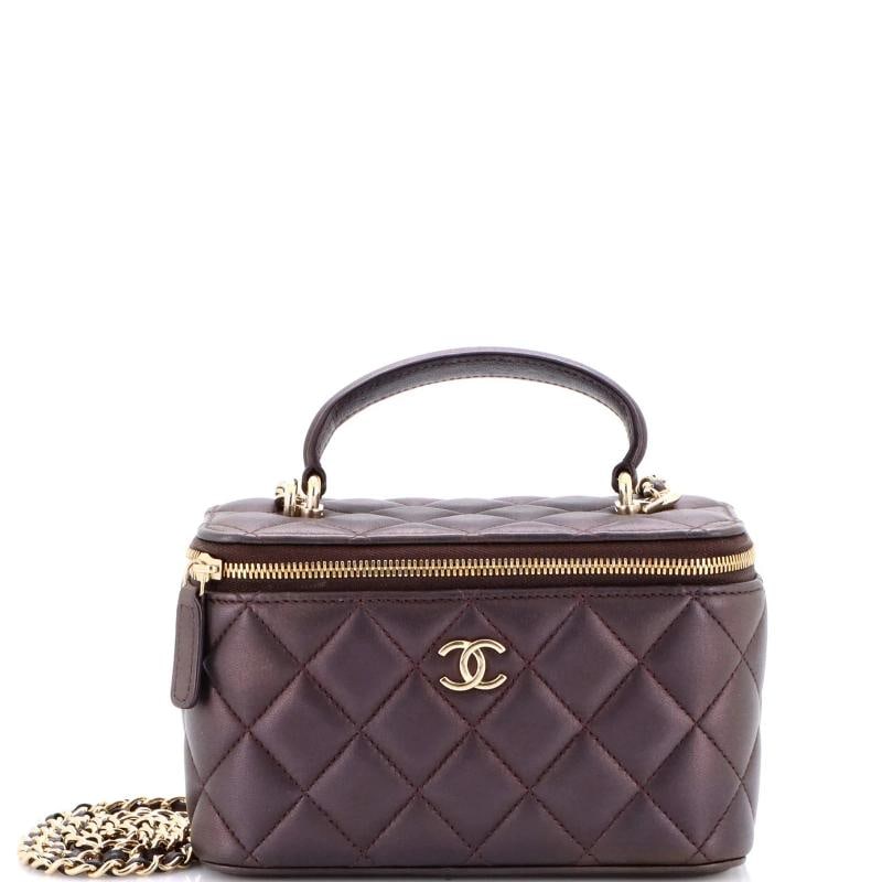 Chanel Classic Top Handle Vanity Case with Chain Quilted Lambskin Small: Measurements: Handle Drop 3", Height 4", Width 6", Depth 3", Strap Drop 23". Condition: Pre-owned - Good,Brand: Chanel,Exterior Material: Leather,Style: Cross Body Bags,Exterior Color: