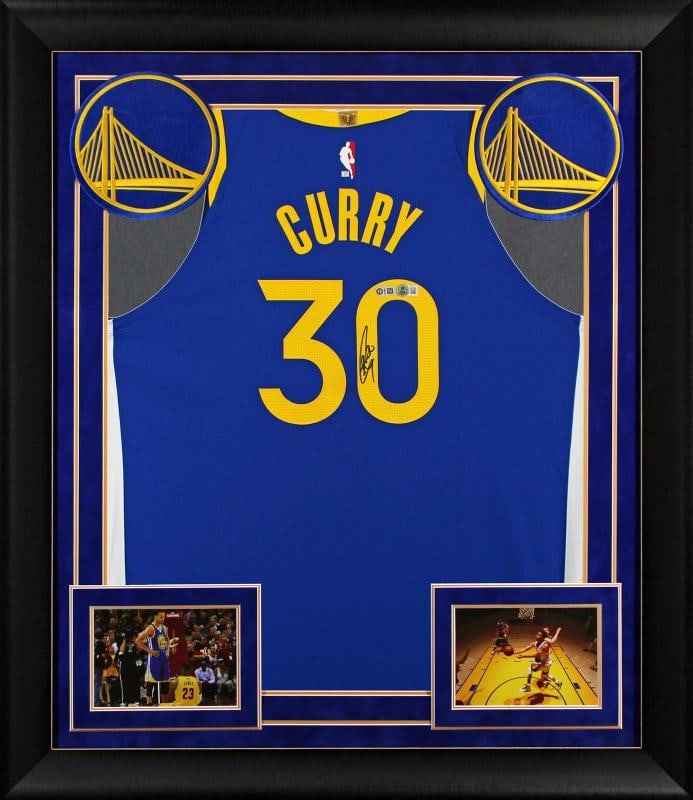 Stephen Curry Signed Blue Nike Icon Edition Authentic Framed Jersey BAS Wit: Player: Stephen Curry,Product: Jersey,Original/Reprint: Original,Autograph Authentication: Beckett,Team: Golden State Warriors,PRODUCT_COA: Beckett,PRODUCT_SIGNED_BY_NAME: Stephen