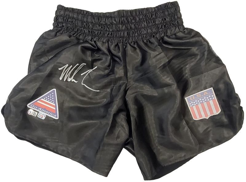 Mike Tyson Autographed Signed Black Boxing Trunks Beckett BAS: Player: Mike Tyson,Sport: Boxing,Product: Memorabilia,Signed: Yes,Autograph Authentication: Beckett Authentication Services (BAS),Original/Reprint: Original,Country of Origin: United States 