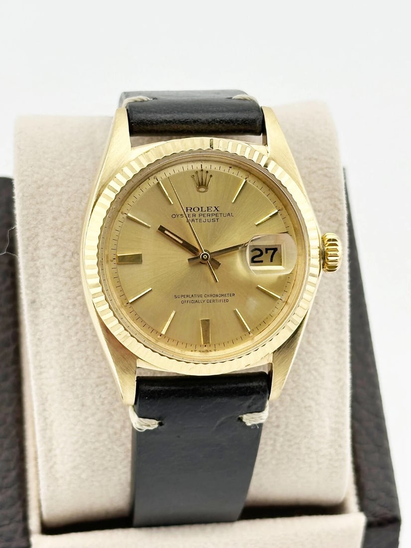 Style Number: 1601 Year: 1961 Model: Rolex Datejust Case Material: 18K Yellow Gold Band:: Condition: Pre-owned - Good,Country of Origin: Switzerland,Bezel Color: Gold, Yellow,Movement: Mechanical (Automatic),Seller Warranty: Yes,Dial Pattern: Pie Pan,Year Manufactured: 1960-1969,Reference