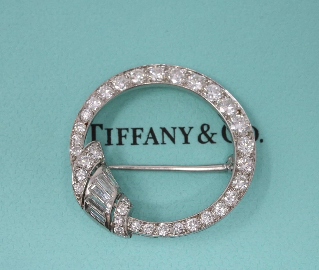 Tiffany & Co. Circle Platinum Baguette & Round Diamond Pin Brooch: Condition: Pre-owned - Excellent: This item has been previously worn; however, it is in excellent condition. Any signs of wear should be shown and described in the seller’s listing. ,Shape: Round,Ma