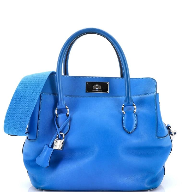 Hermes Toolbox Bag Swift 26: Accessories: Keys, Lock, Clochette, With Strap Measurements: Handle Drop 3.5", Height 10", Width 10", Depth 7", Strap Drop 10.5". Condition: Pre-owned - Good,Brand: Hermes,Exterior Material: Leather,S