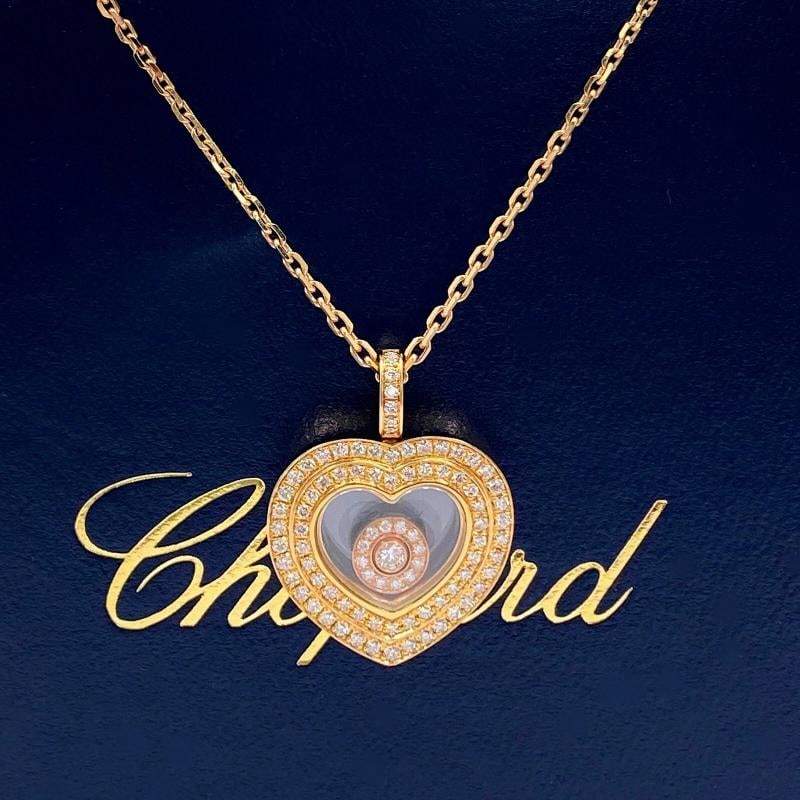 Chopard Happy Hearts Diamond Rose Gold Pendant Necklace 18K 16' Box: Style: Pendant Metal: 18kt Rose Gold Size / Measurements: 16' Chain with Lobster Clasp Pendant Size: 17 X 24 MM TCW: 0.46 tcw Main Diamond: 89 Round Brilliant Diamonds Color & Clarity: G / VS Hallmark