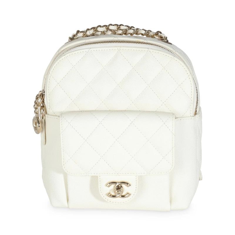 Chanel White Quilted Caviar Small CC Day Backpack Handbag: Condition: Pre-owned - Good,Country of Origin: France,Dimensions: 6.5 x 7.25 x 2,Handbag Accessories: Box;Dustbag;Authenticity Card;Retail Tag,Bag Width: 6.5 in,Bag Depth: 2 in,Bag Height: 7.25 in,Dep