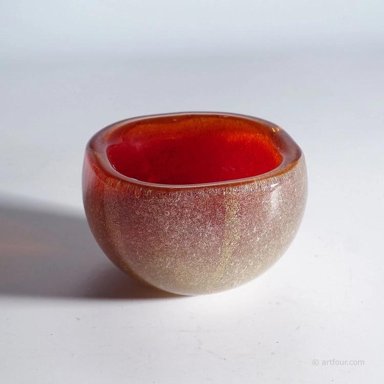 Vetro Sommerso Bowl by Carlo Scarpa for Venini Murano ca. 1930s: A vetro sommerso bollicine bowl designed by Carlo Scarpa ca. 1936. Manufactured by Venini Murano Venice in the 1930s. Thick ruby red glass with multiple air bubbles and gold foil inclusions. Acid etch