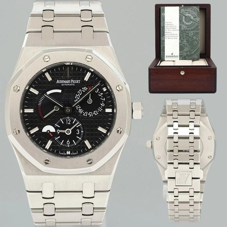 2010 PAPERS MINT Audemars Piguet Royal Oak Dual Time Steel 26120ST Black 39mm: Brand Audemars Piguet (Guaranteed Authentic) Model Royal Oak Reference Number 26120ST Serial Number G Metal Steel Case Size 39.00mm Wrist Size This watch will currently comfortably fit 7.50" Movement