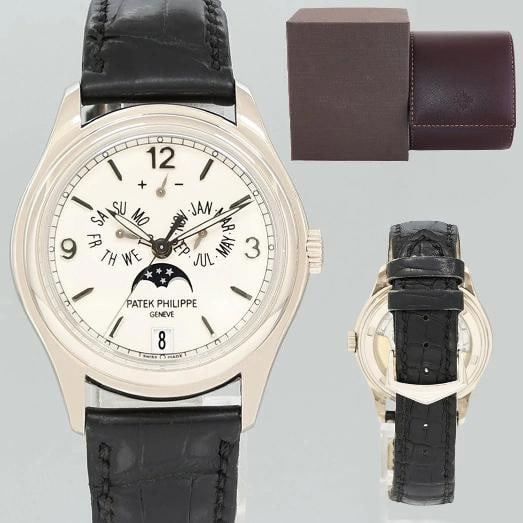 MINT Patek Philippe 5146G White Gold Annual Calendar 39mm Moon Watch: Brand Patek Philippe Model Annual Calendar Reference Number 5146G Gender Men's Metal White Gold Case Size 39mm Wrist Size Will fit up to a 7.50" inch wrist Movement Patek Philippe Self-winding mechani