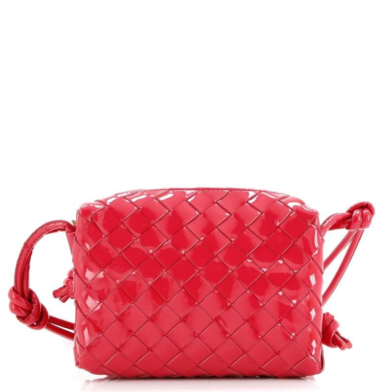 Bottega Veneta Loop Crossbody Bag Intrecciato Patent Mini: Condition: Pre-owned - Good,Brand: Bottega Veneta,Exterior Material: Patent Leather,Style: Cross Body Bags,Exterior Color: Pink,Department: Women,Size: Mini Low Estimate: 3000.00High Estimate: 4000.00