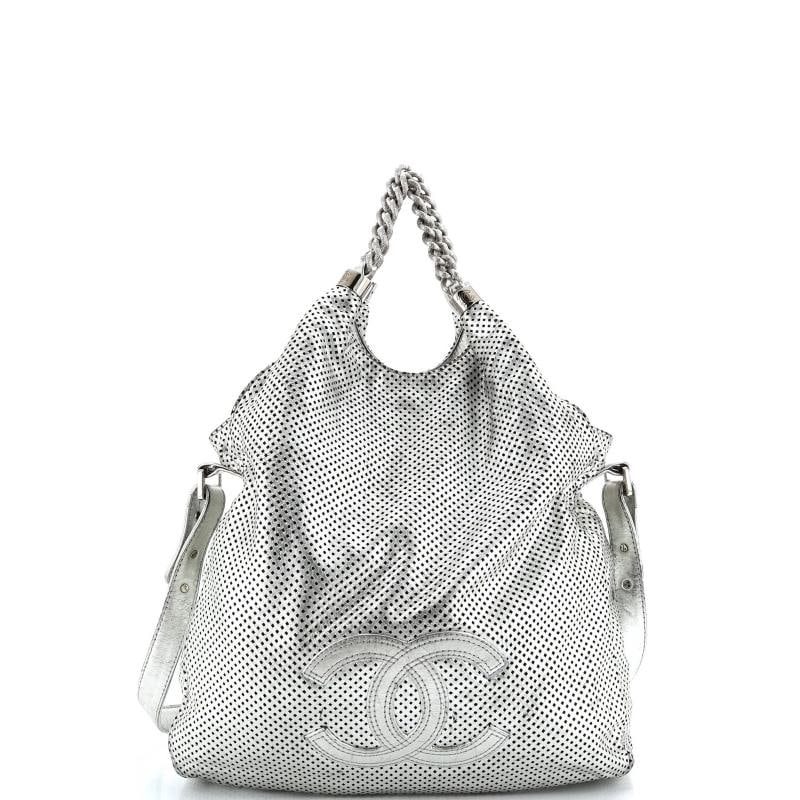 Chanel Rodeo Drive Hobo Perforated Leather Medium: Condition: Pre-owned - Good,Brand: Chanel,Exterior Material: Leather,Style: Hobos,Exterior Color: Silver,Department: Women,Size: Medium,Accessories: With Strap Estimated Retail Price: $2,495