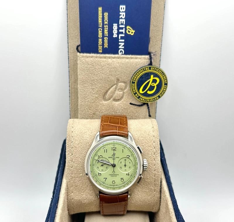 Breitling Premier Chronograph B09 AB0930 40mm Pistachio Dial Steel Box Booklet: Style Number: AB0930 Serial: 4354*** Model: Breitling Premier Chronograph B09 Case Material: Stainless Steel Band: Brown Leather Bezel: Stainless Steel Dial: Pistachio Green Crystal: Sapphire Crystal