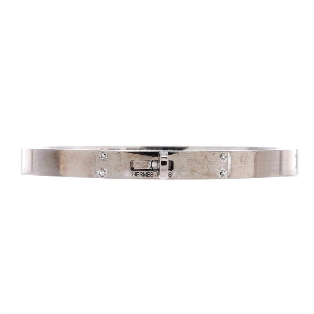 Hermes Kelly Bracelet 18K White Gold with 4 Diamonds Small: Measurements: Circumference: 6.20 ", Width: 5.55 mm. Condition: Pre-owned - Good,Brand: Hermes,Main Stone: Diamond,Metal: 18K White Gold,Metal Purity: 18K,Style: Bracelet,Type: Bracelet,Color: White