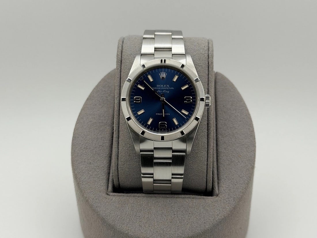 Rolex Air King Precision 14010 34mm Blue Dial Stainless Steel: Style Number: 14010Serial: U9****Year: 1997 Model: Rolex Air-King Case Material: Stainless Steel Band: Stainless Steel Bezel: Stainless Steel Engine Turned Bezel Dial: Blue Crystal: Sapphire Case Size