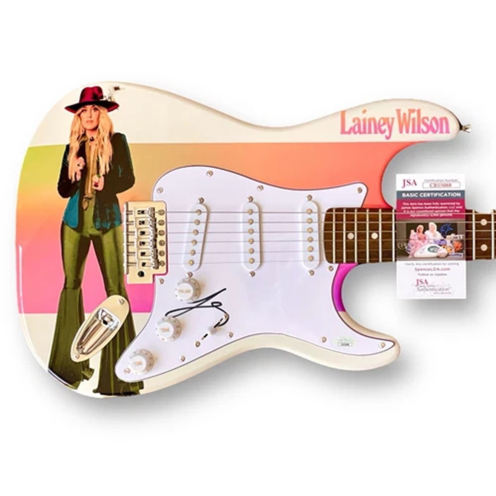 LAINEY WILSON Signed Guitar JSA COA Custom HEART LIKE A TRUCK DIRTY LOOKS: Industry: Music,Signed: Yes,Autograph Authentication: James Spence (JSA),Original/Reproduction: Original,Country of Origin: United StatesItem Type: Full Size Autograph Edition Stratocaster style elect