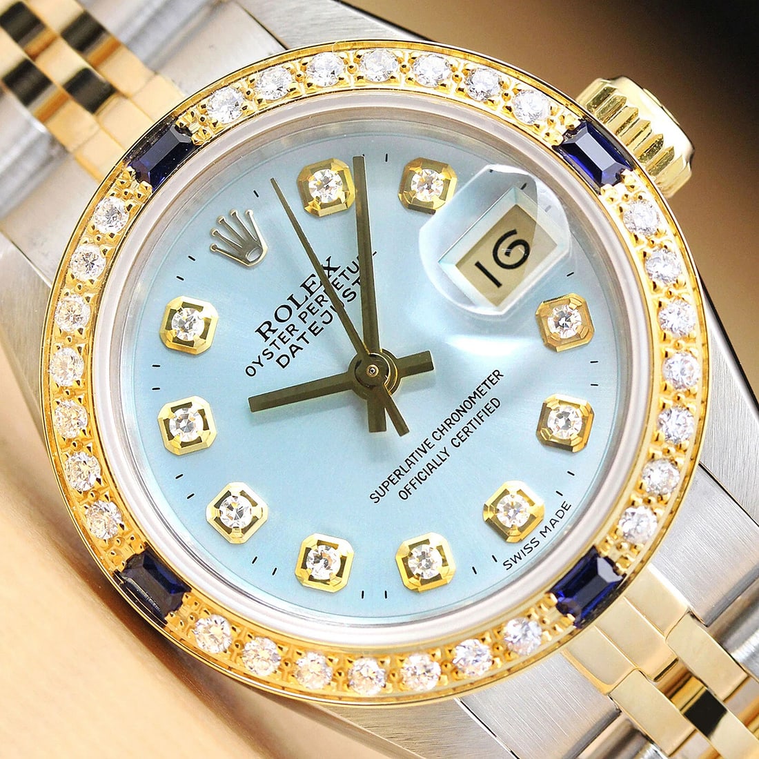 ROLEX LADIES DATEJUST 69173 ICE BLUE SAPPHIRE DIAMOND 18K GOLD STEEL WATCH: Condition: Pre-owned - Good,Bezel Color: Gold,Max Wrist Size: 6.26-6.75 in,Number of Jewels: 29 Jewels,Indices: Diamond Markers, 12-Hour Dial,Band: Rolex Two-Tone Jubilee Bracelet,Bezel: Custom 18K Ye