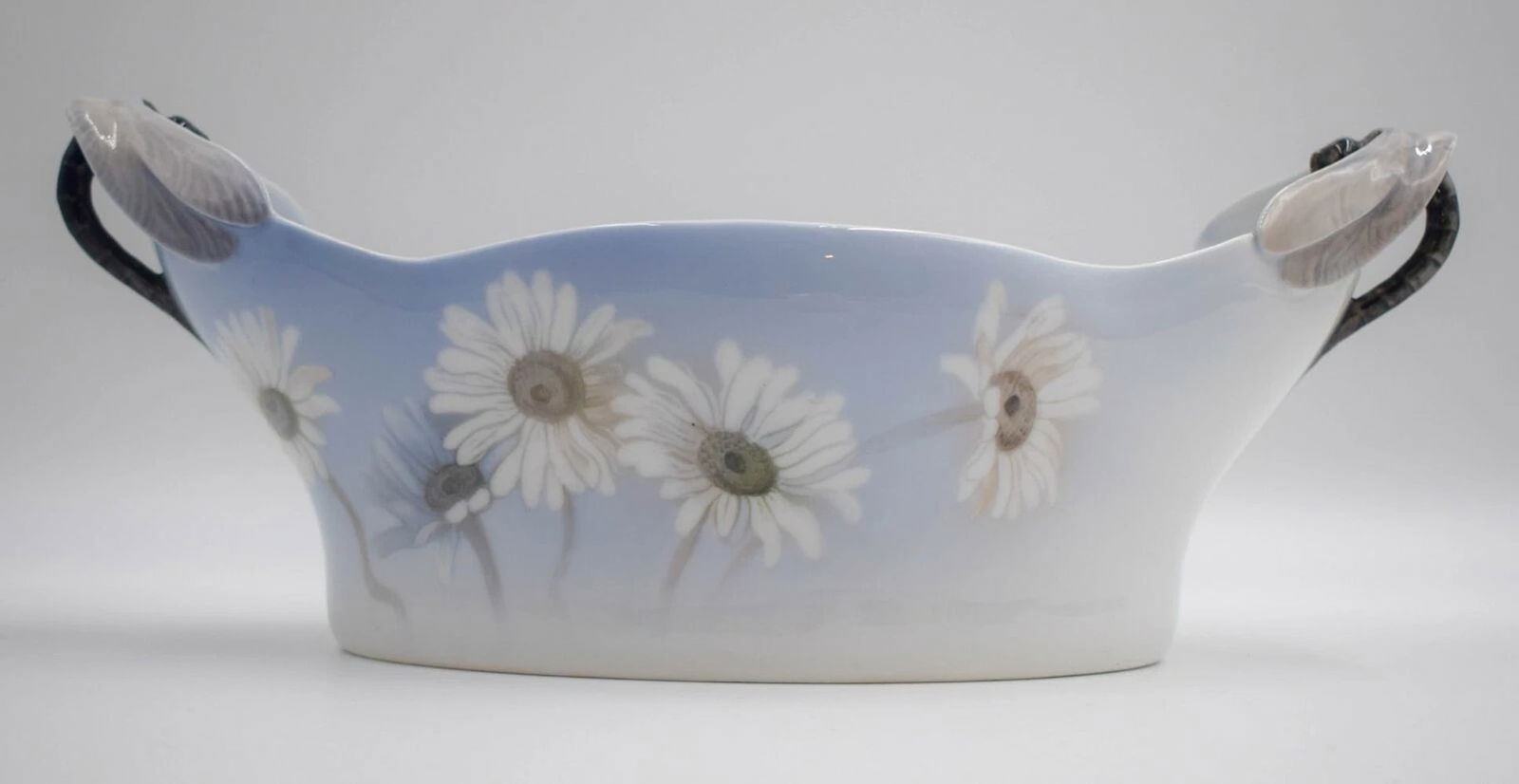 Royal Copenhagen Art Nouveau Dragonfly Centerpiece Hand Painted, Circa 1925: Measures 4 5/8" high by 5 5/8" wide by 12" long. Style: Art Nouveau,Type: Centerpiece,Features: Hand Painted,Year Manufactured: 1925,Brand: Royal Copenhagen,Country of Origin: Denmark