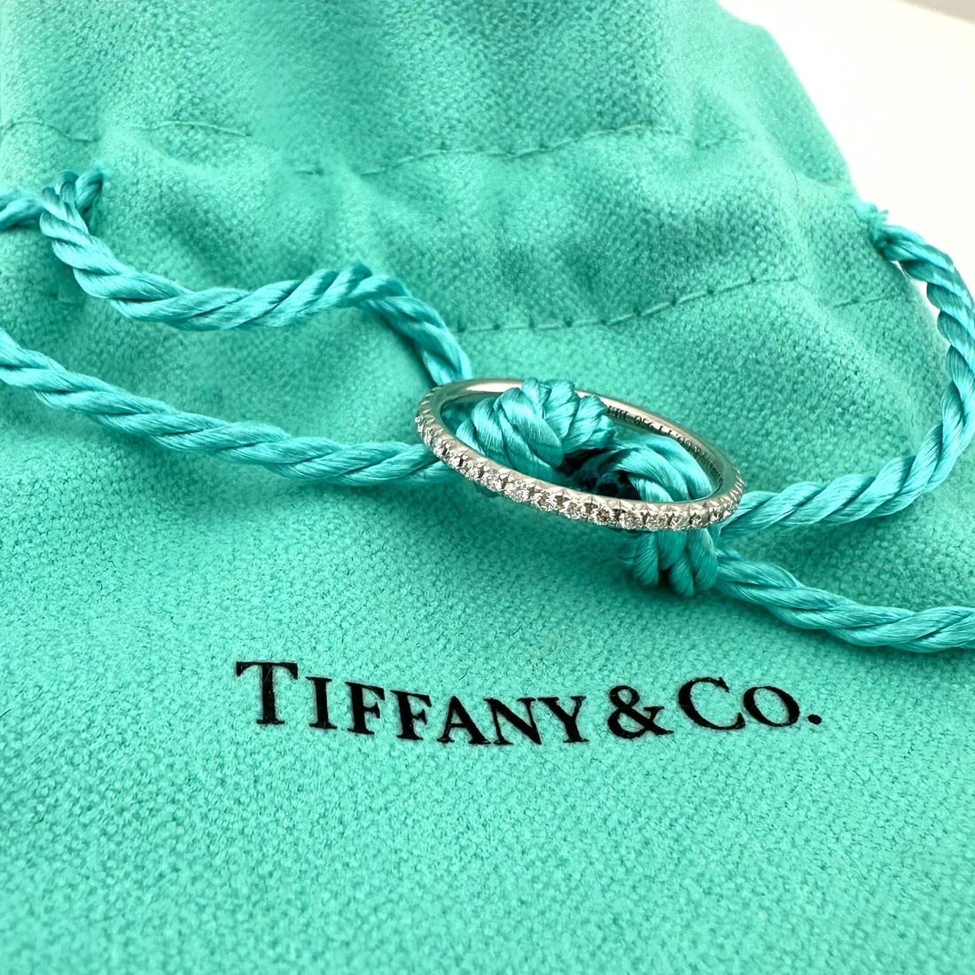 Tiffany & Co Metro full Eternity Diamond Band Ring in Platinum: Condition: Pre-owned - Good,Main Stone Creation: Natural,Shape: Round,Signed: Yes,Main Stone Color: White/Colorless,Metal: Platinum,Main Stone: Diamond,Brand: Tiffany & Co.,Ring Size: 4.25,Setting Sty