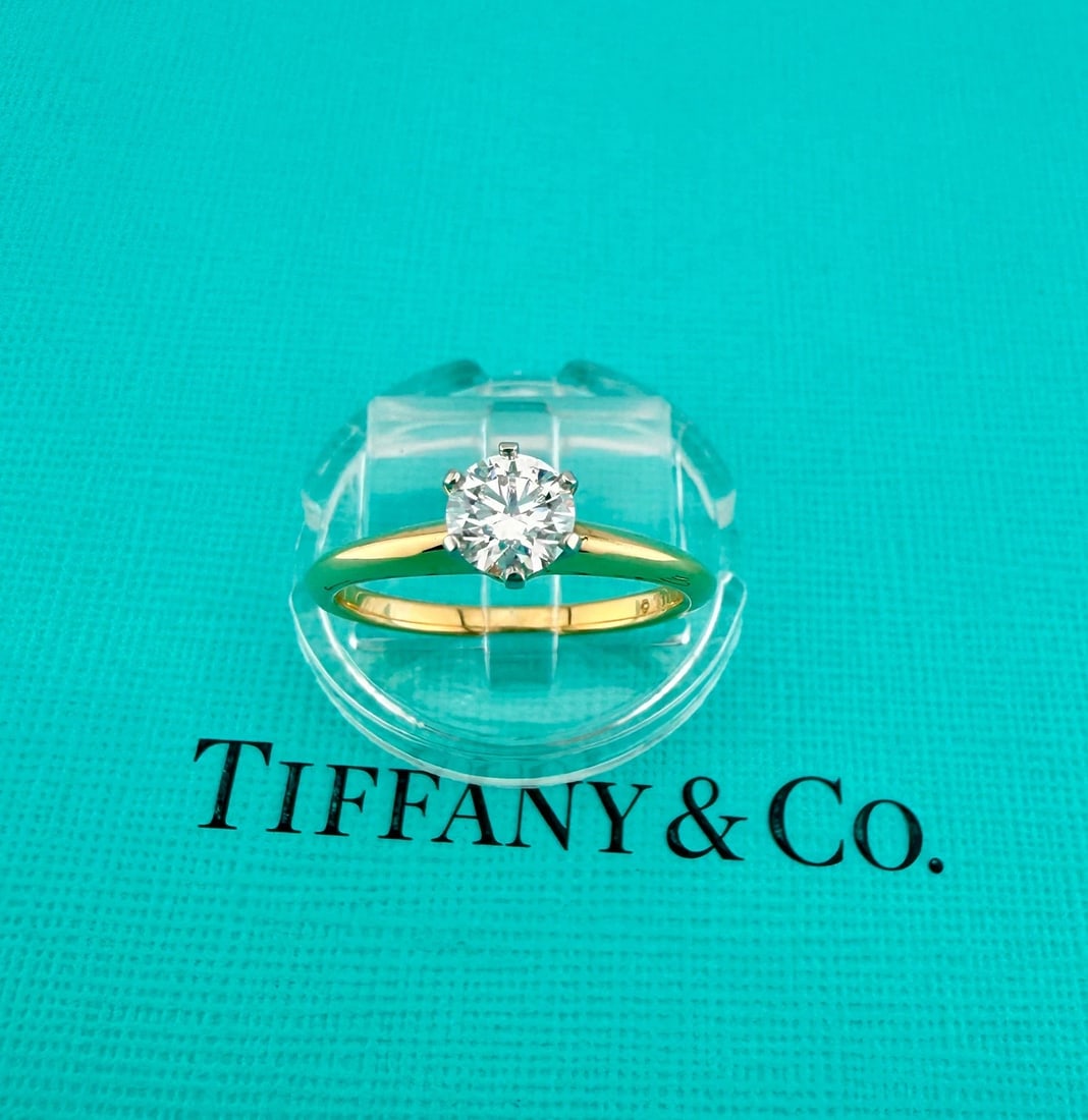 Tiffany & Co Round Diamond 0.46 ct E VVS1 18k Yellow Gold & Plat Engagement Ring: Condition: Pre-owned - Good,Antique: No,Number of Diamonds: 1,Main Stone Color: White,Metal: Yellow Gold,Main Stone: Diamond,Personalize: No,Ring Size: 6,Main Stone Treatment: Not Enhanced,Department: