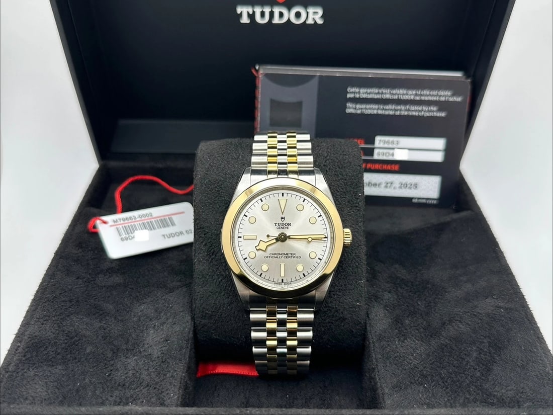 NEW 2025 Tudor 79663 Black Bay 39MM Silver Dial 18K Gold Steel Box Paper: Style Number: 79663Serial: 69D4***Year: 2025 Model: Tudor Black Bay 39 Case Material: Stainless SteelBand: 18K Yellow Gold & Stainless Steel Bezel: 18K Yellow Gold Dial: Silver Face: Sapphire Crystal