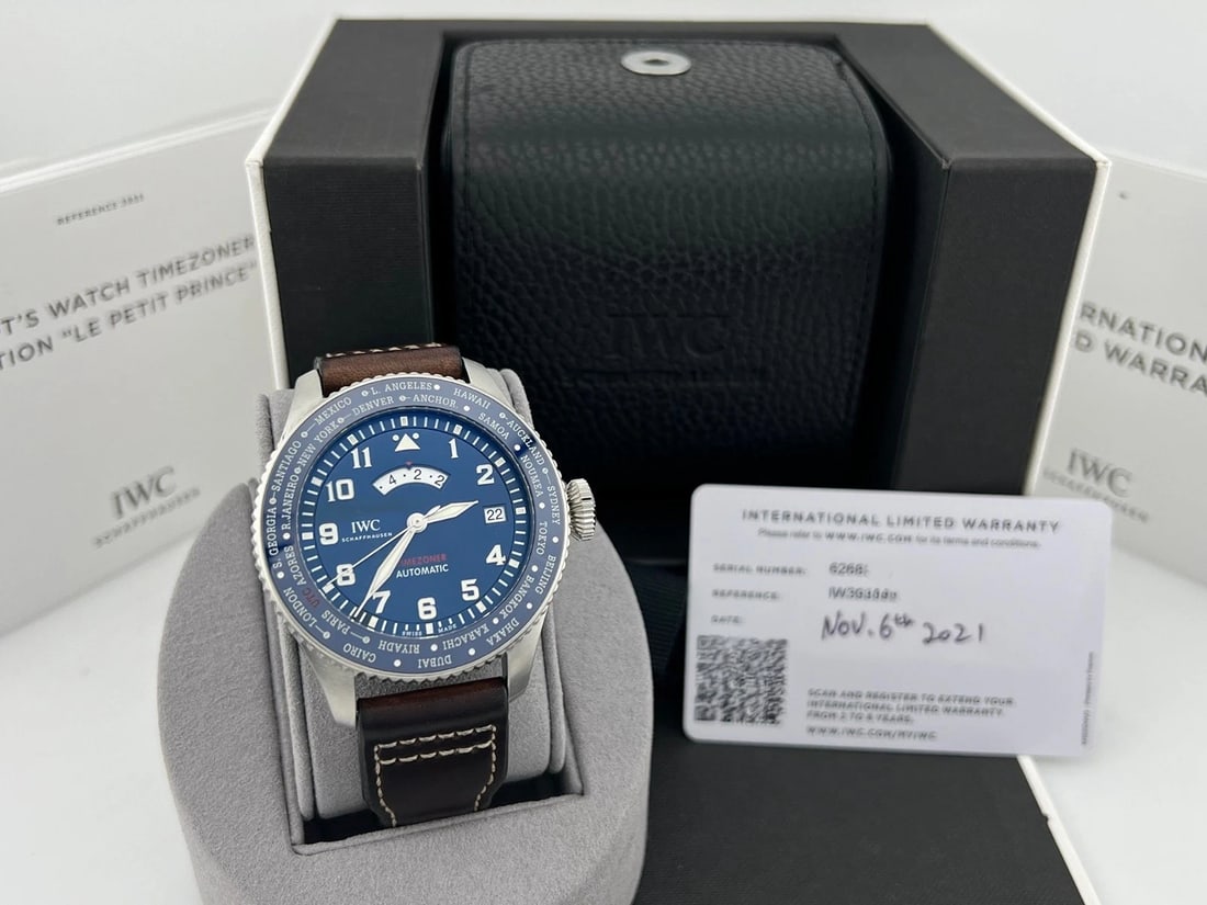 IWC Pilot Timezoner Le Petit Prince IW395503 46mm Blue Dial Steel Box Paper: Style Number: IW395503Serial: 626****Year: 2021 Model: IWC Pilot Timezoner Limited Edition "Le Petit Prince" Case Material: Stainless Steel Band: Brown Leather Bezel: Blue Ceramic Dial: Blue Crystal: